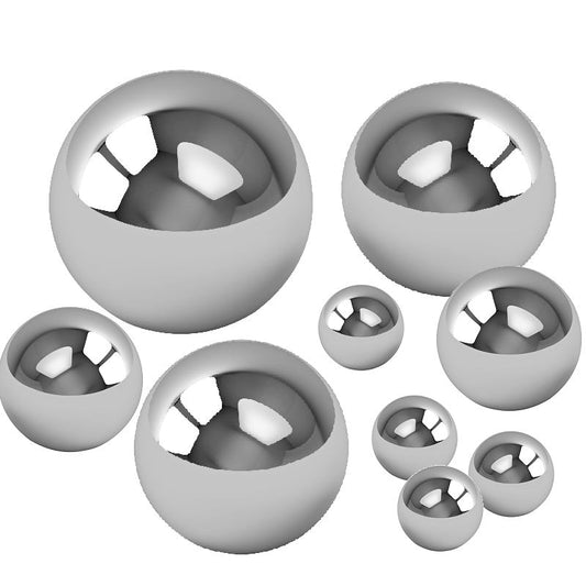 Various sizes of shiny metal ball bearings illustrating ball bearing grades explained